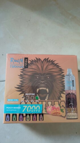 Coffret de cigarette électronique RandM Tornado avec un graphisme de gorille au goût de pêche et de mangue, une technologie de bobine en maille et 7 000 bouffées par paquet.